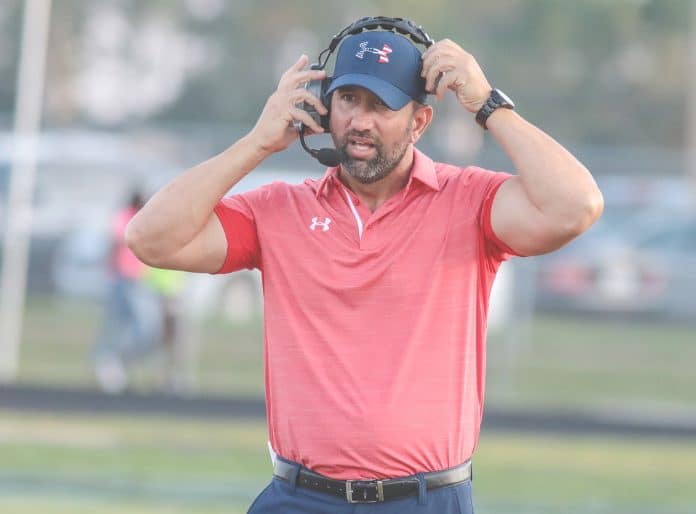 Football Springstead-NCT;   Head Coach Mike Garofanoon the sidelines during the match against Nature Coast Tech on the Sharks' turf. Garofano has been the head coach for the Eagles since 2013.  Photo by Alice Mary Herden.