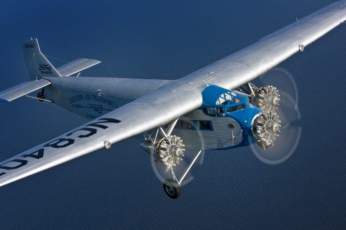 In flight 4. EAA TRI-MOTOR