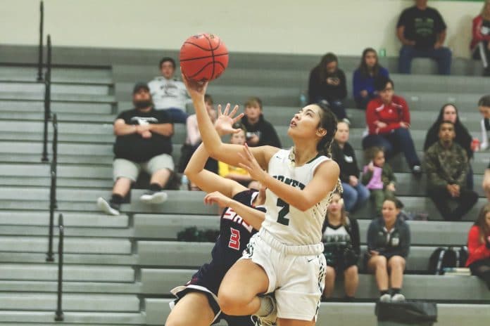 Morgan McDaniel goes up for a layup for two points against Springstead during the 2019-2020 season.  Photo by Alice Mary Herden