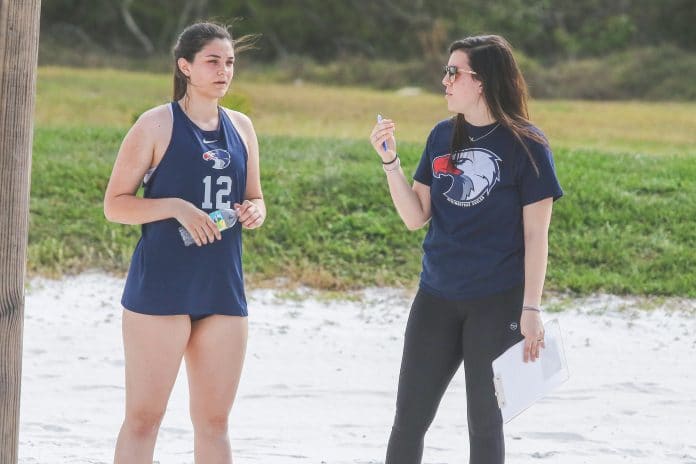 Coach Jordan McIntrye talks with Ashley Ward after her game against Tarpon Springs.