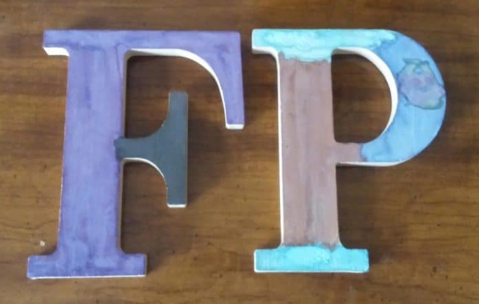 Just one week before Franca was hospitalized, she painted these wooden plaques of her initials