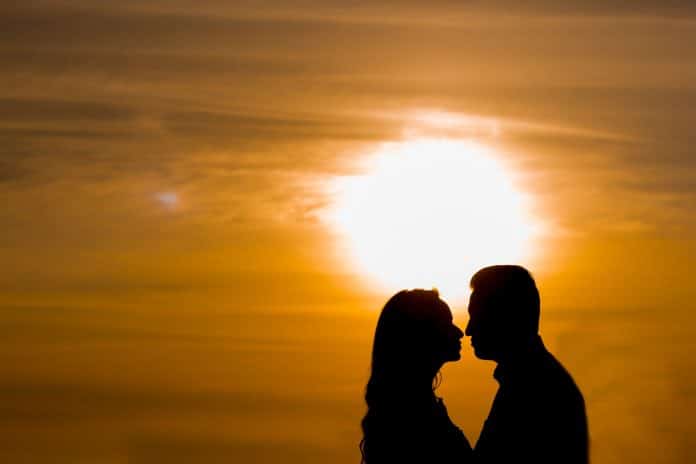 Couple and sunrise