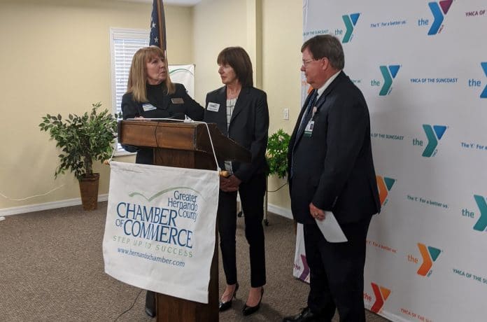 From left to right:  Dr. Donna Burdzinski, Provost PHSC North Campus, Pat Crowley, and Mickey Smith Oak Hill Hospital CEO at the May Chamber of Commerce Monthly meeting  as Crowley is honored for her 20 years of service. Photo courtesy of GHCCC.