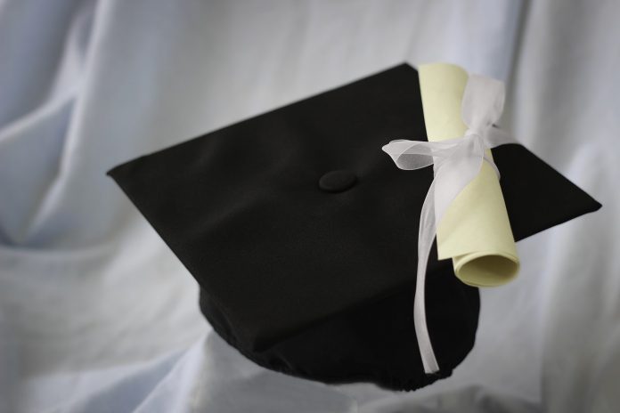 Graduation cap and scroll