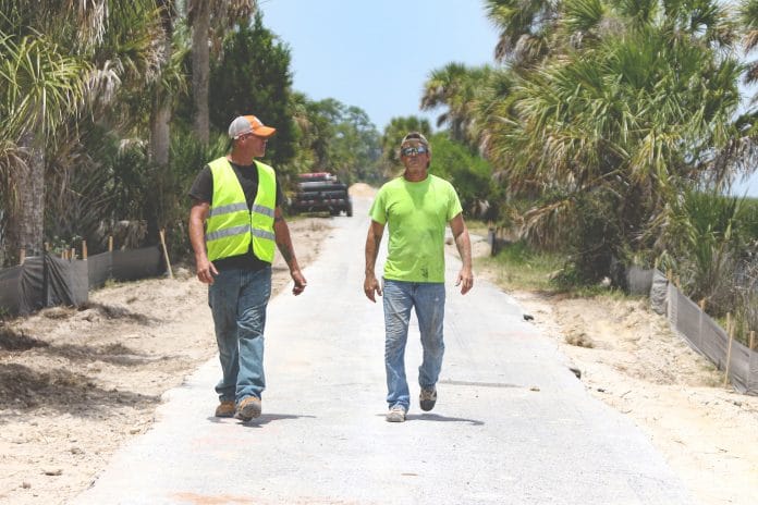 John Ray, Dirt Foreman(left), and Anthony Weaver, Pipe Foreman (right), are working on the Bayou Drive restoration.