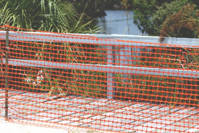 Hernando County Parks and Rec began preparations to detain public access to the boardwalk at Jenkins Creek Park by installing orange plastic fencing around the outer edge of the boardwalk.