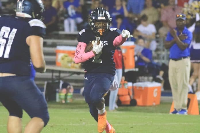 Bears Junior Contae Cason points to Crystal River’s defense for coverage while he is rushing towards the end zone