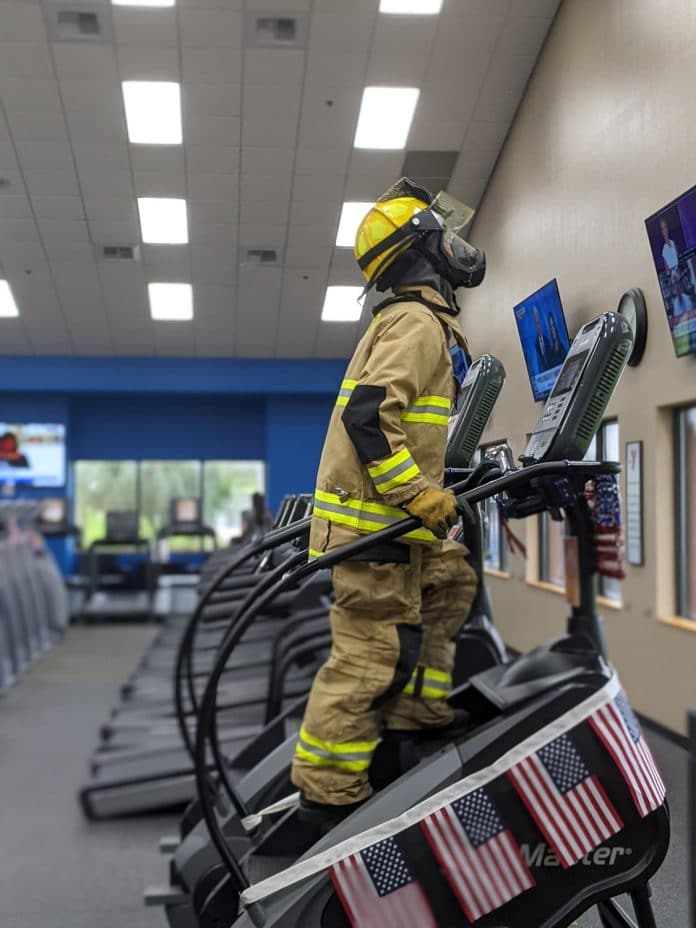 Matthew Dion on the stepper machine at the YMCA in Spring Hill.  His goal was to climb 110 stories in honor of the firefighters responding to the World Trade Center on Sept. 11, 2001.