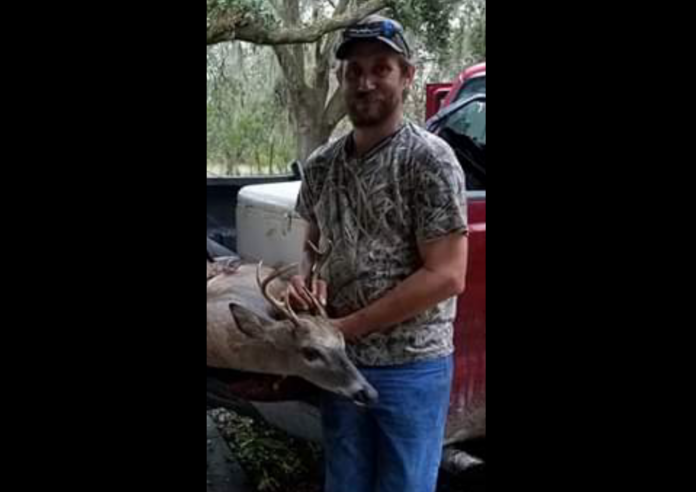 Benton Geer, with a dandy six point buck lured in by the sounds of a bleating doe