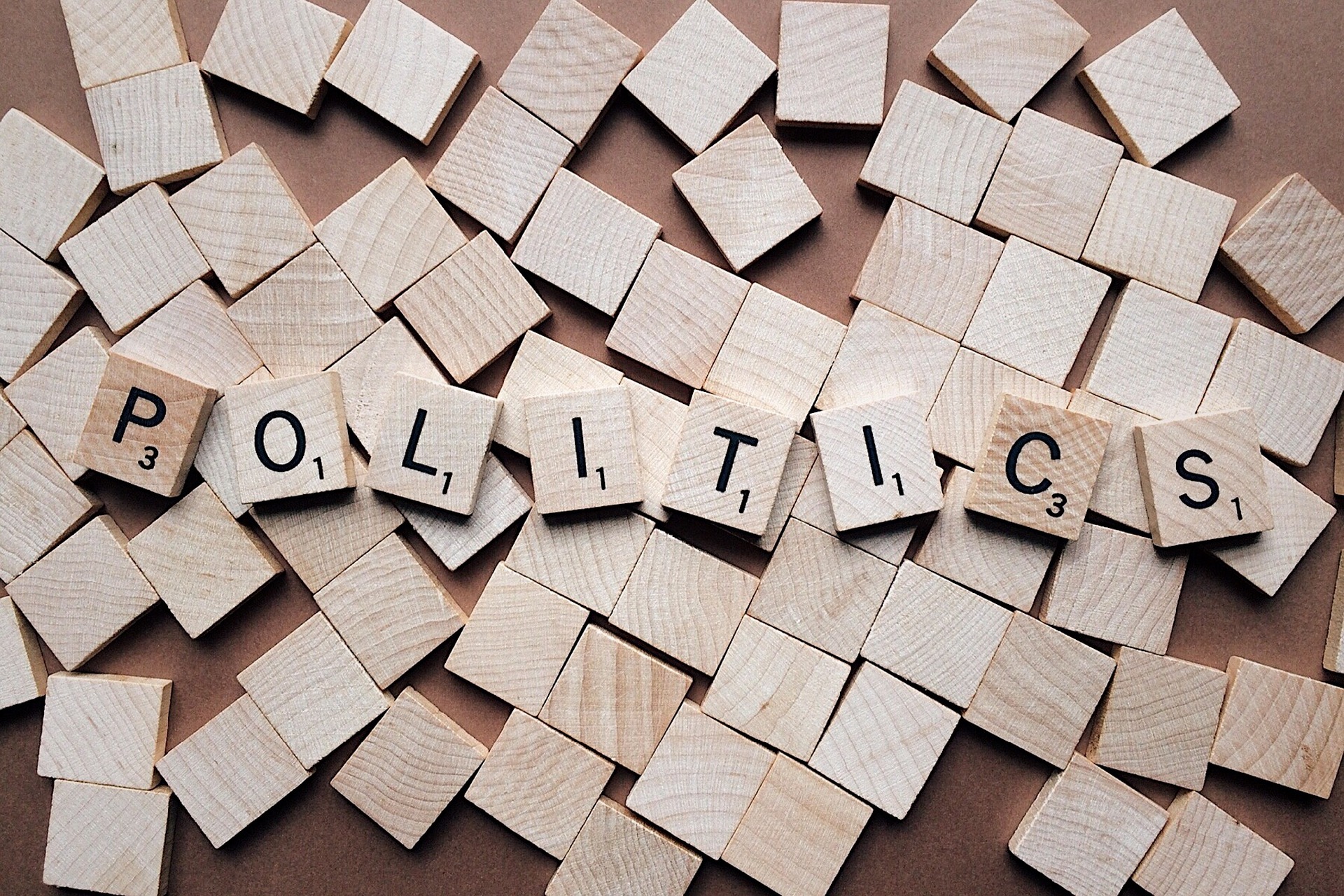 Scrabble tiles spelling "Politics"