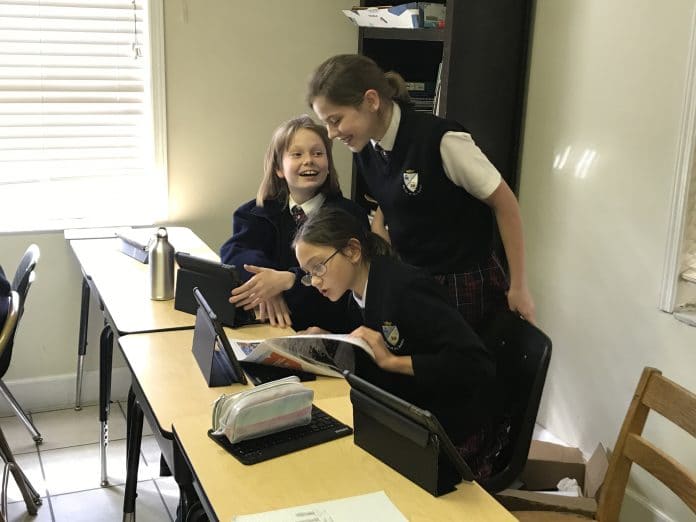 tudents at All Saints Academy in Brooksville read the Hernando Sun!