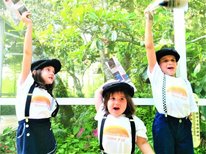 Our little newsies in 2015, Julie Catherine, Beatrice and Max.