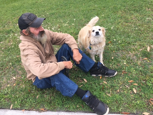 In the picture is Jeff and Mimi. When Mimi was lost after Jeff took a trip to the hospital. Ellen searched throughout Hernando County to return Mimi back to Jeff.