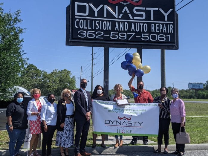 Dynasty Collision and Auto Repair receiving the 2021 Commissioner’s Business Recognition Award