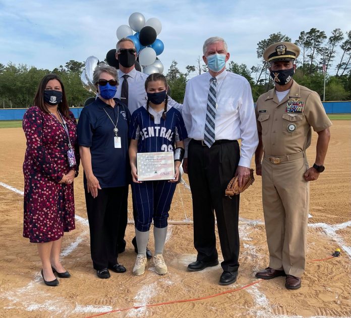 (L-R) Central High School Principal Kelly Slusser, School Board Member Kay Hatch, Kelsey Barats-Shumate, School Superintendent John Stratton, U.S. Representative Daniel Webster , Lt. Commander Christian Cruz