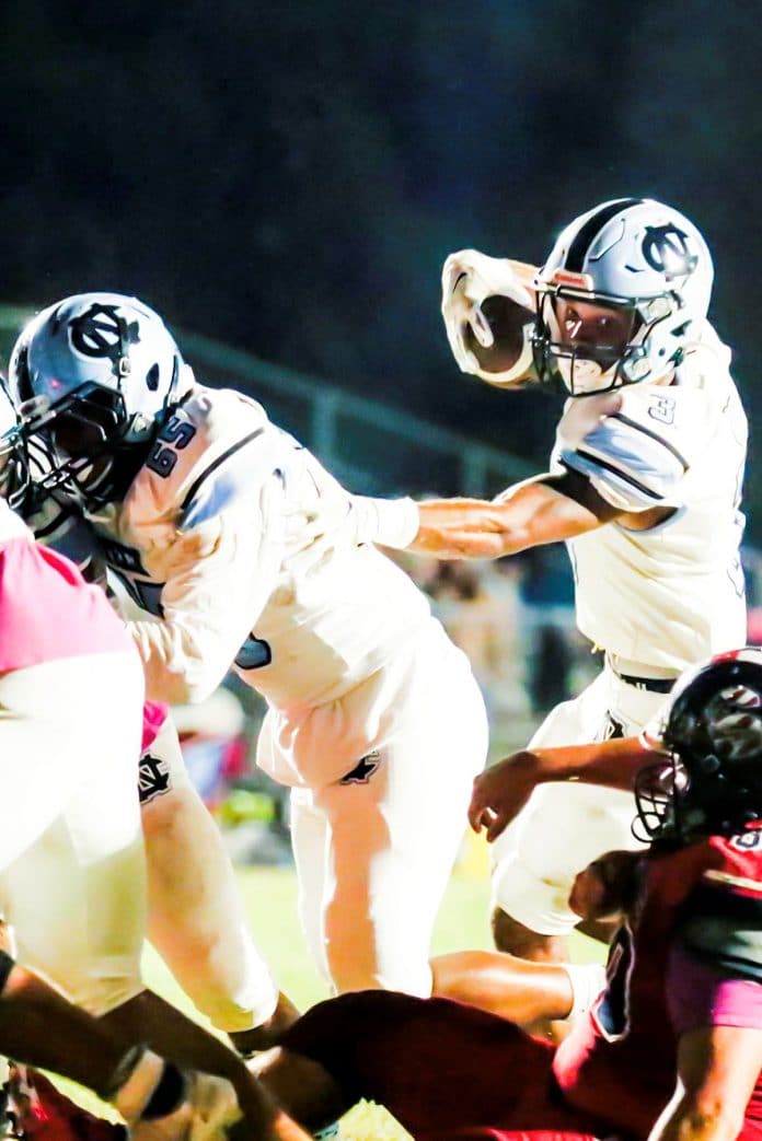 October 16, 2020, at Springsteads Football Field, Nature Coast Shark #3 Jr. Cross Licht is focused on what route he will take to reach the goal. Photo by Cherl Clanton, Hernando Sun.