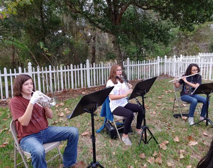 Orchestra members from left to right: Deuce Chamberlain, Ellie Shuff, Abri Anger