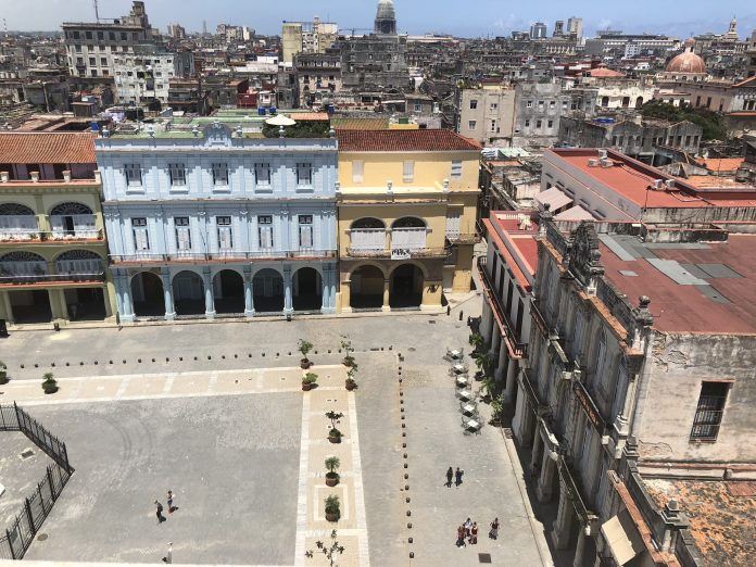Dilapidated buildings surround this square for tourists in Cuba. Cubans are not allowed to enter tourist districts in Cuba. Photo courtesy of Michelle Smith.