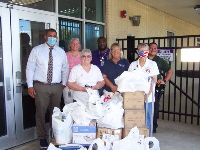 Pictured left to right are Mike Lastra, Brooksville Elementary Principal, Daquiri Benard, Teacher, Gladys Stover, Unit 186, Tommy Roberts, Custodian, Joanne Holobinka, Unit 186, Patti Motzer, Unit 186 Children & Youth Chair, and Corey Zarcone, Resource Officer.  Not pictured, Unit 186 President Lynda Anderson. 