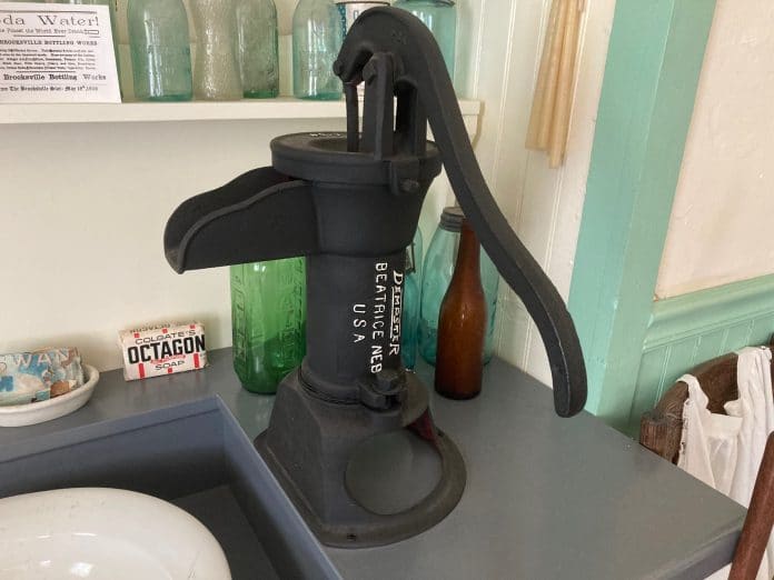 A hand pump at May-Stringer's farmhouse sink in the kitchen drew water from the cistern underneath the house.