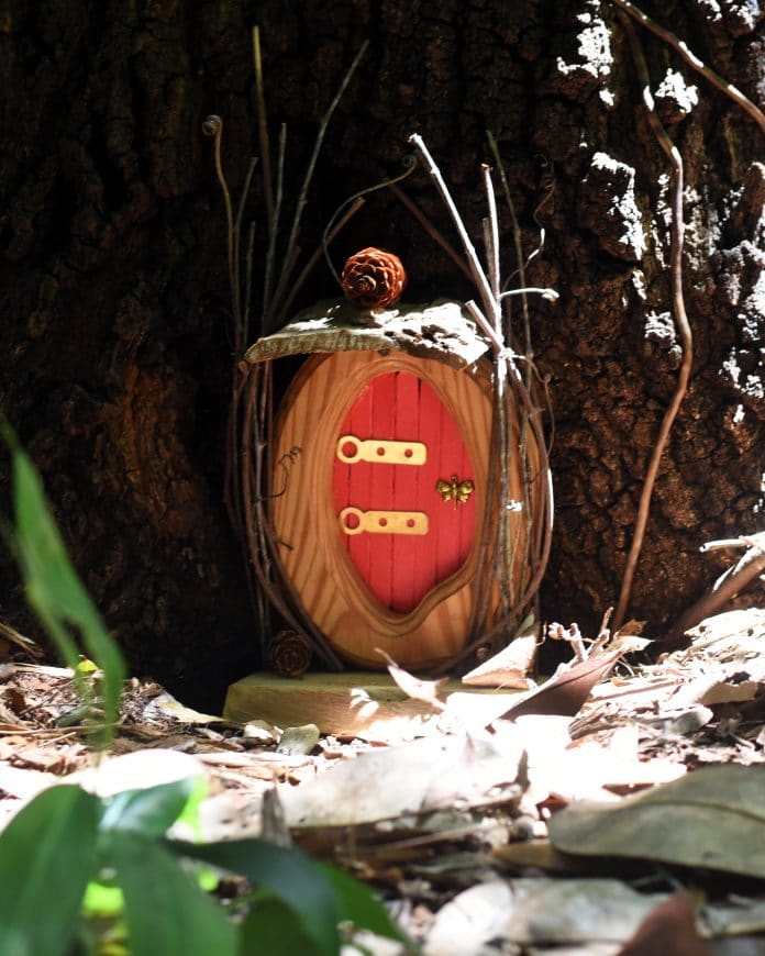 One of the fairy doors by artist Carla Mogan, nestled at the bottom of an oak tree at the Nature Coast Botanical Gardens in Spring Hill.