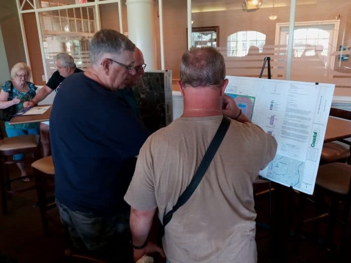 Local residents perusing maps and plans for the Lennar homes proposal.