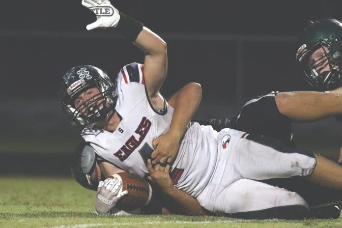 Eagles Owen Andress scores a touchdown against Weeki Wachee during the game on Friday night, September 3.