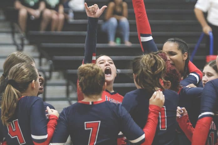 Lady Eagles cheer after a point gain over Weeki Wachee during the Preseason Volleyball event held at Nature Coast Technical School on August 17.