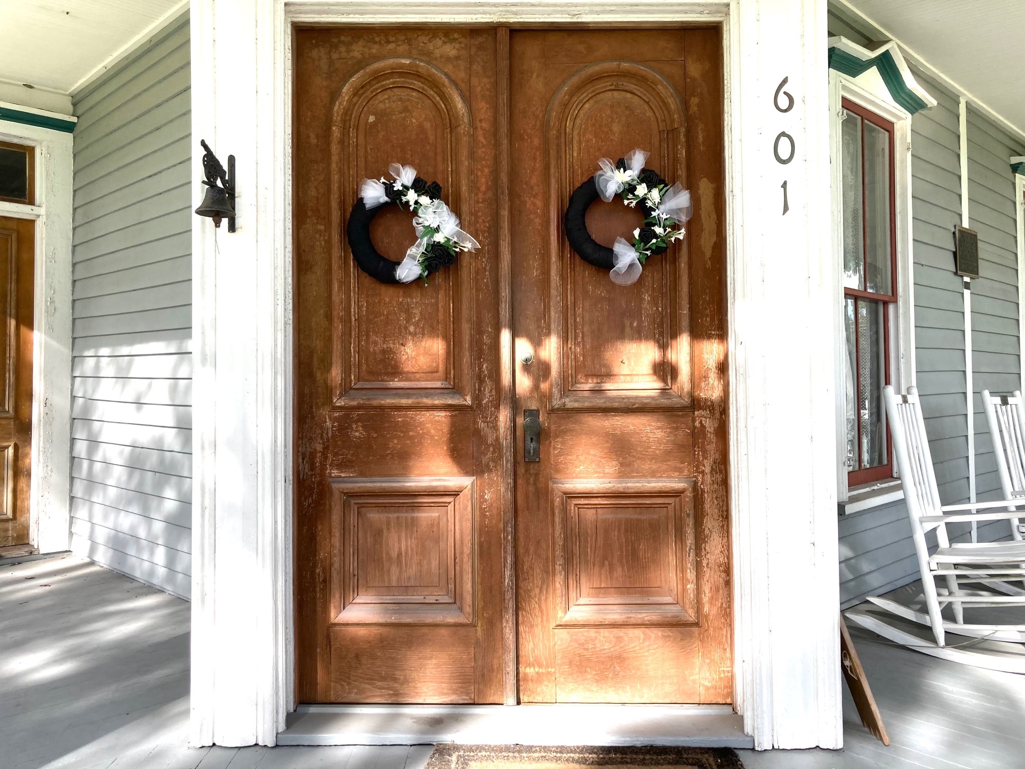 Mourning wreaths on the front doors of the May-Stringer Museum in Brooksville