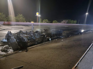 Burned wreckage of tractor trailer