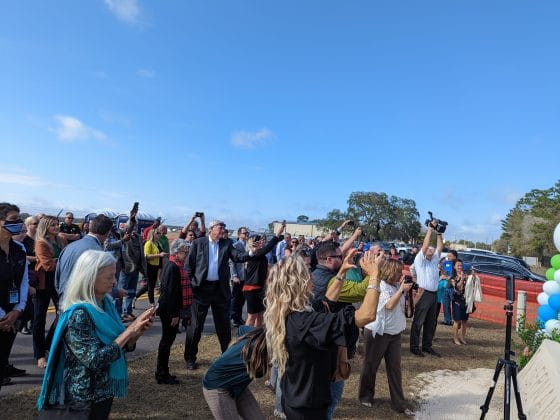 ommunity members excited to capture the ground breaking on camera.