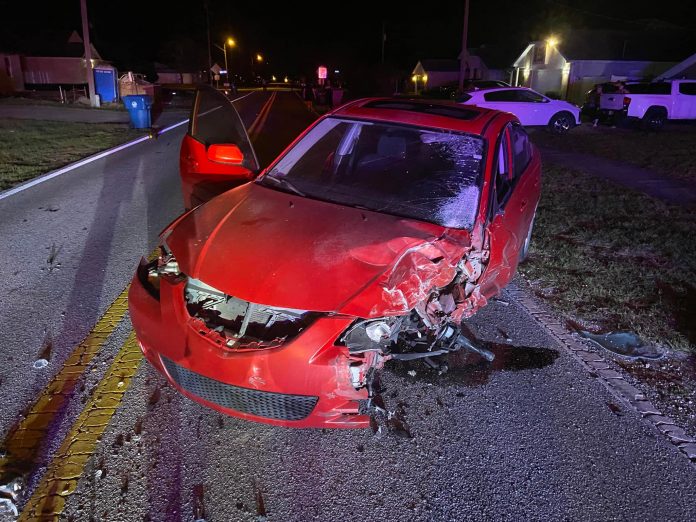 A red sedan involved in the accident