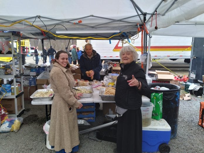 The Soup Kitchen volunteers at The People's Convoy in Hagerstown, MD. From left to right: Amy, Richard Smith and Sarah Smith Photo by Steve Goodwin.