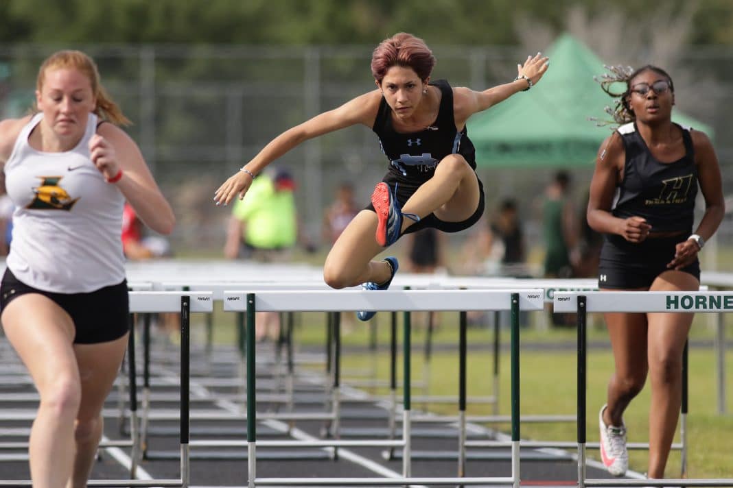 Track and field athletes compete in the Gulf Coast 8 Conference Championship held on April 14, 2022 at Weeki Wachee High School. Photography by Alice Mary Herden