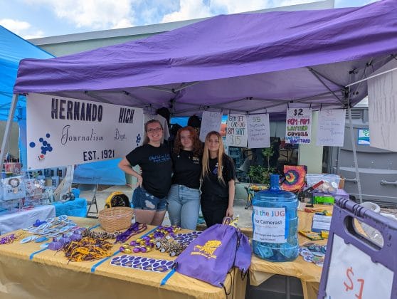 Fundraising for HHS Journalism and Yearbook; From left to right, Matanya LeGrand, Rachel Robertson, and Ember Wilson