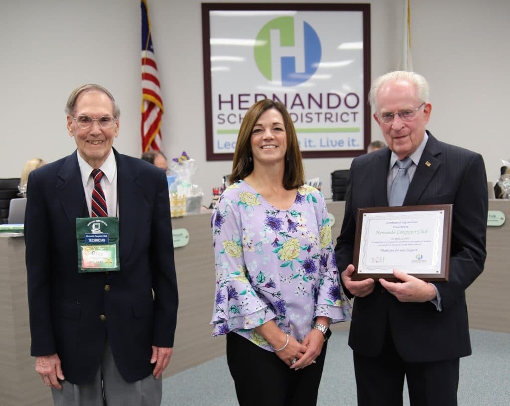 From left to right: Hernando Computer Club (HCC) technician Gray Alexander, Spring Hill Elementary Assist Principal Angela Miller-Royal, HCC Community Service Director Hollis Taylor.  (Photo courtesy of Hernando Schools)