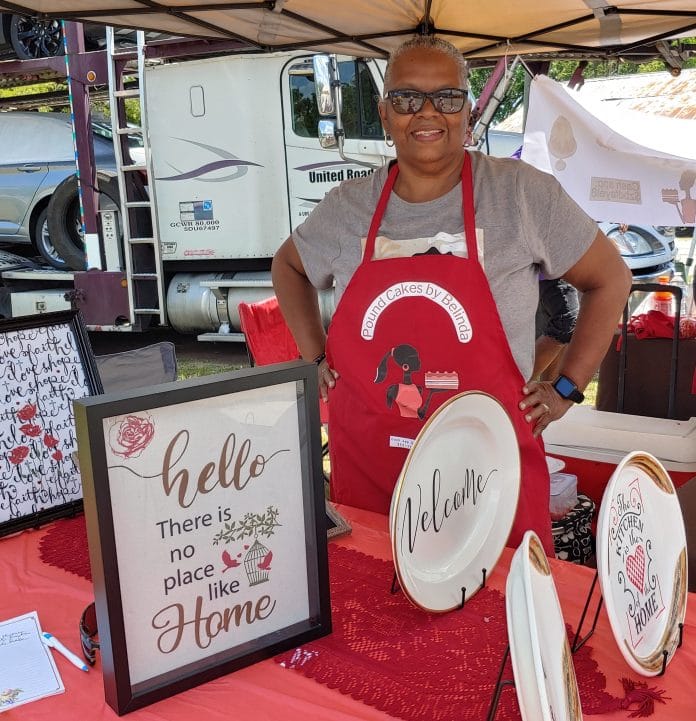 Patricia Moore with her handcrafted stenciled artwork