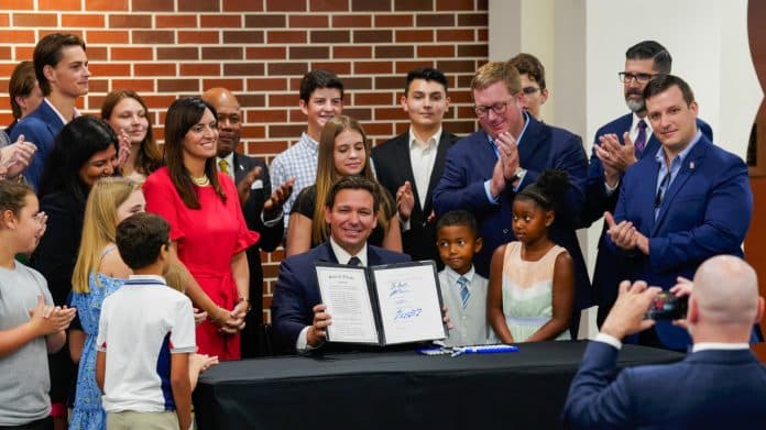 Gov. DeSantis signs House Bill 461 in Tampa.