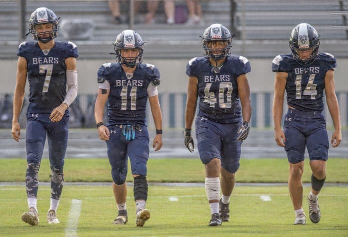 Central High captains, 7 Caden Bergantino, 11 Malachi Russell, 40 Chris Robinson, 14 Braden Joyner, approach the coin toss before the home game versus Anclote. Photo by JOE DiCRISTOFALO