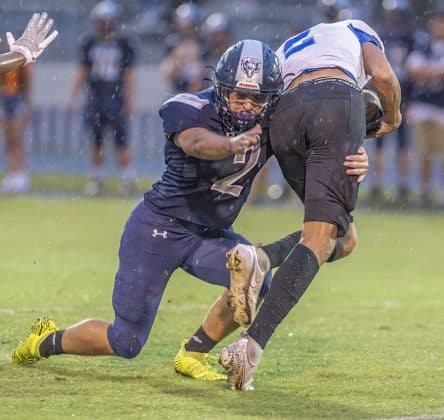 Central High, 2,Isaiah Beutler wraps up Anclote High’s ,2, Dominic Marotta in the home game with Anclote High.Photo by JOE DiCRISTOFALO