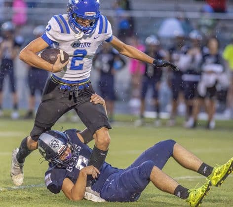 Central High, 2,Isaiah Beutler wraps up Anclote High’s ,2, Dominic Marotta in the home game with Anclote High.Photo by JOE DiCRISTOFALO