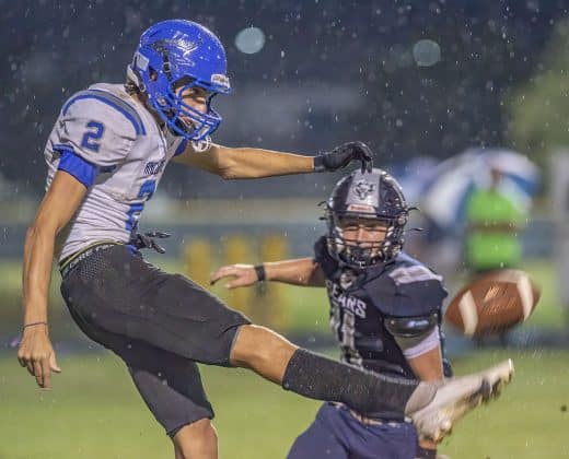 Anclote High’s ,2, Dominic Marotta gets off a punt under pressure Friday night at Central High. Photo by JOE DiCRISTOFALO