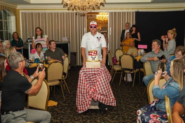 Jerry Zampella, PJ’s Brick Oven Pizza, presents his Pizza Boy cake.