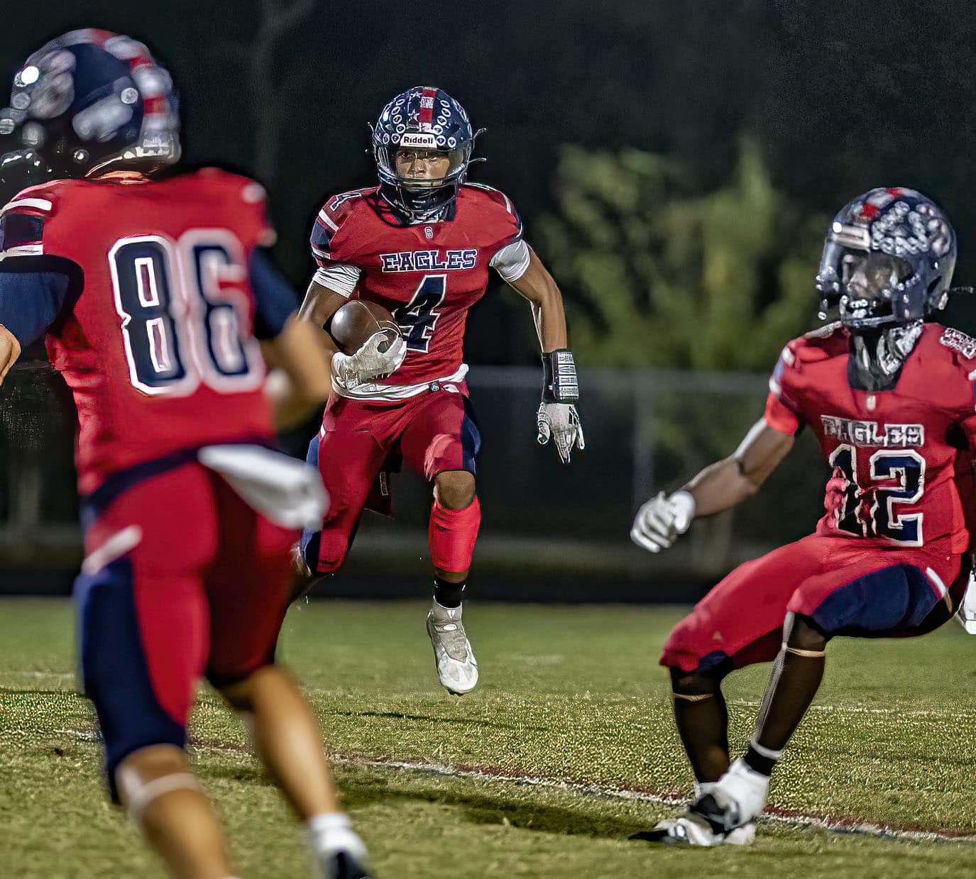 Springstead ,4, Connor Mccazzio sizes up the blocking on a running play. Photo by JOE DiCRISTOFALO