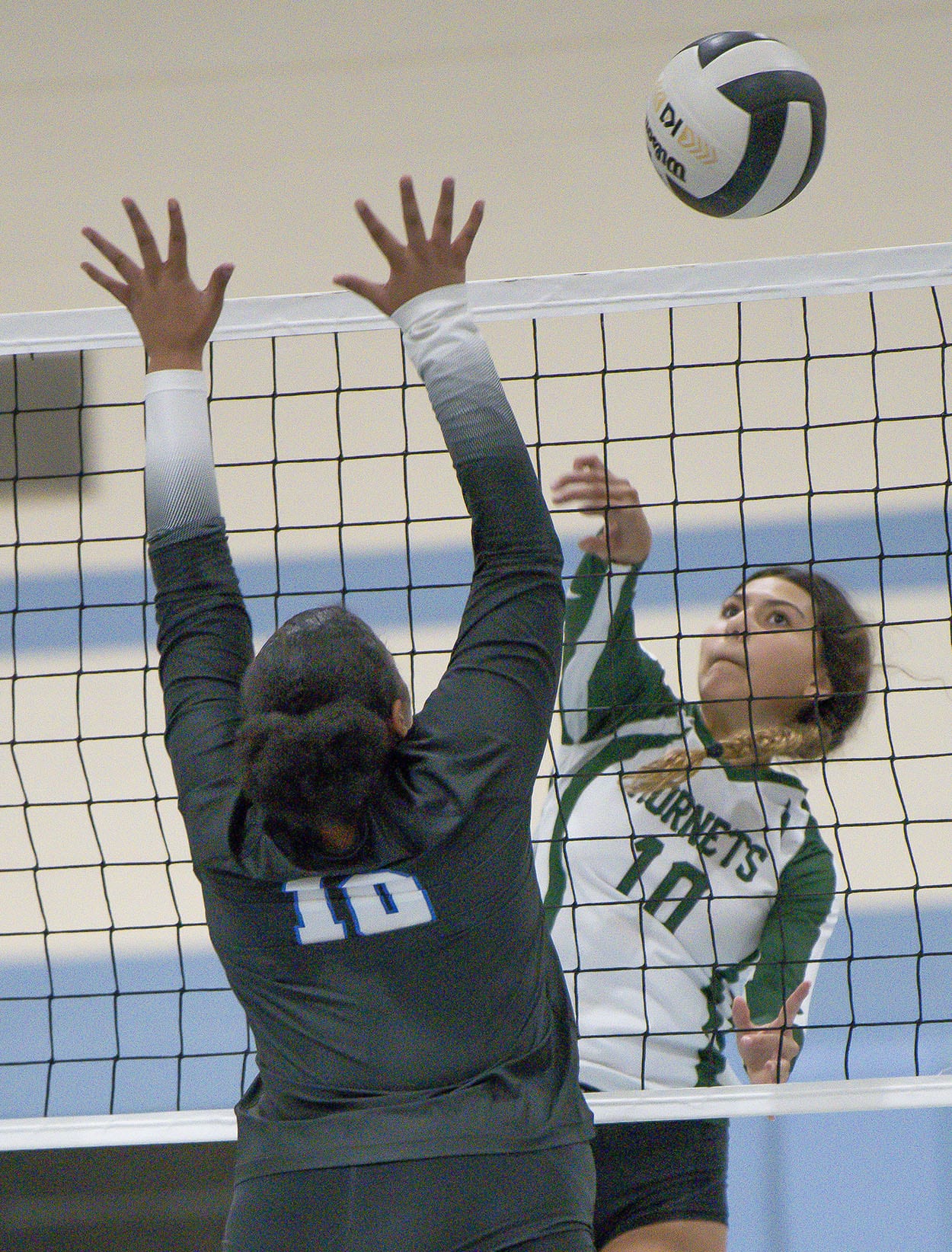 Weeki Wachee, 10, Jadyn Aponte hits over the Anclote defense during the 4A district 9 championship match. Weeki Wachee won the match 3-1 despite dropping the first game. Photo by JOE DiCRISTOFALO