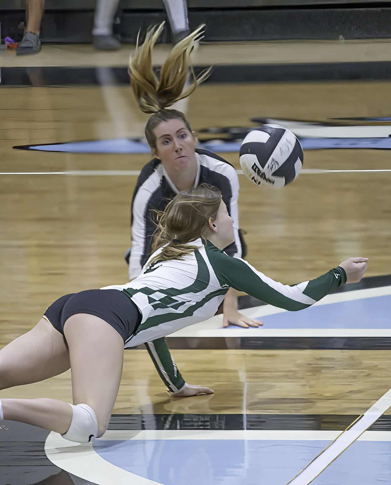 Weeki Wachee, 2, Delaney Evans goes all out to dig a hard hit in the 4A district 9 championship match versus Anclote High Thursday at Nature Coast High. Photo by JOE DiCRISTOFALO