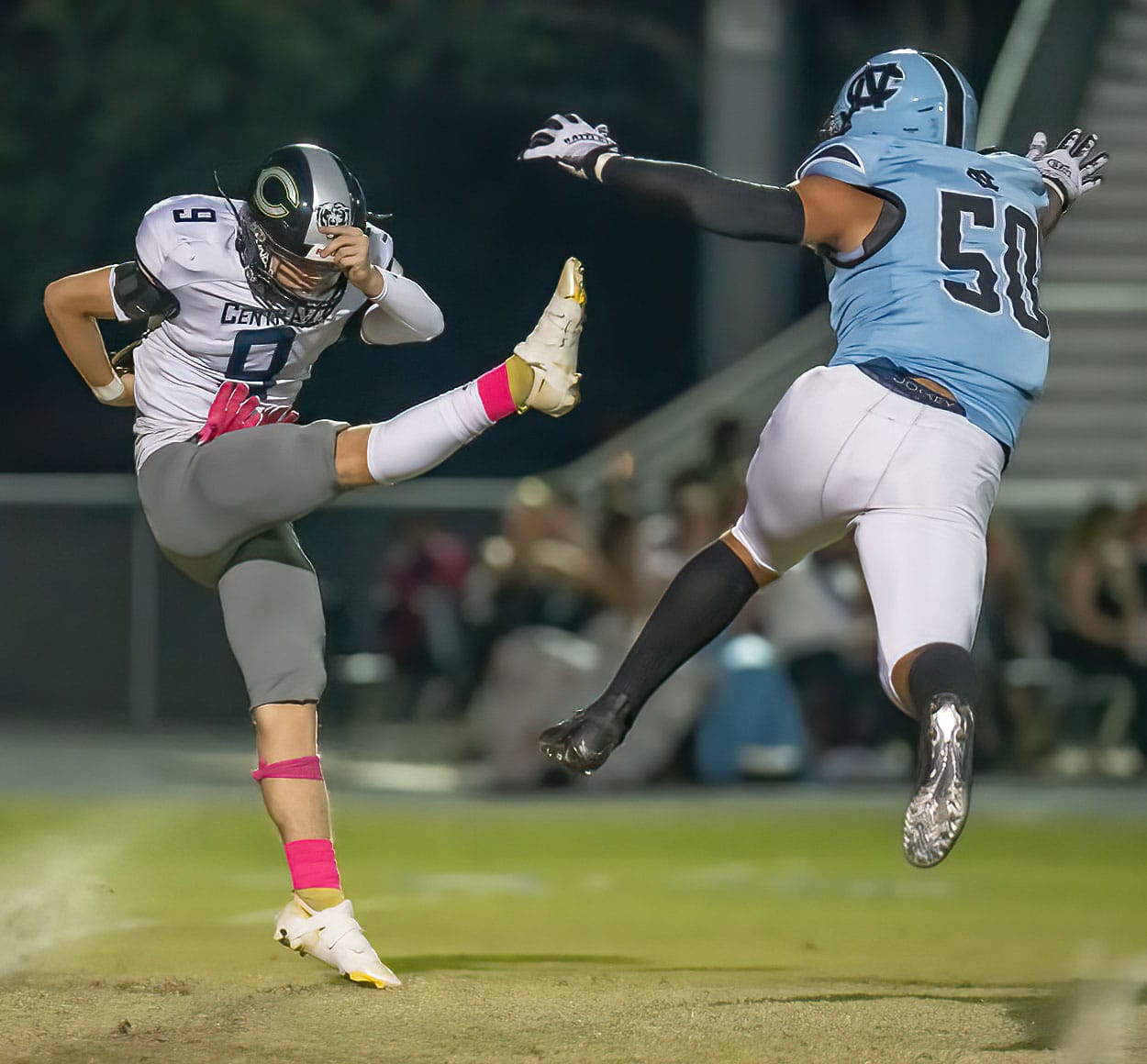 Nature Coast, 50, Gabriel Rios came close to blocking the punt of Central, 9, Colt Botner but was flagged for running into the kicker on the play. Photo by JOE DiCRISTOFALO