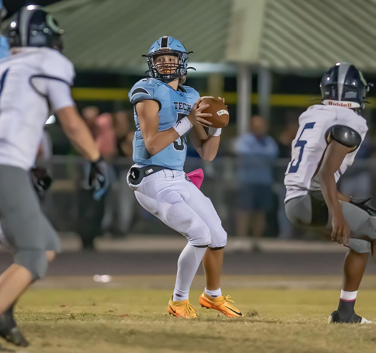 NCT QB, 5, Jackson Hoyt looking downfield for a receiver found ,13, Brady Nowlin, not pictured, for a touchdown in the game versus Central High at Nature Coast. Photo by JOE DiCRISTOFALO