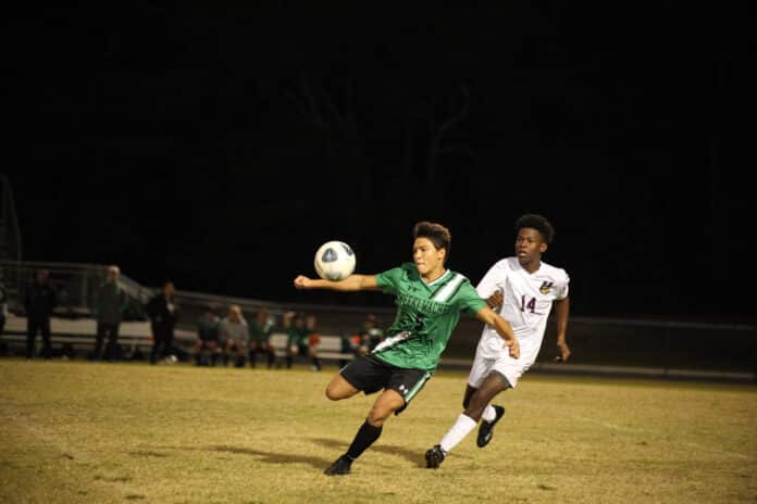 Weeki Wachee, Sr., Gavin Maye controls a pass Nov. 18, 2022. Photo by Hanna Fox.