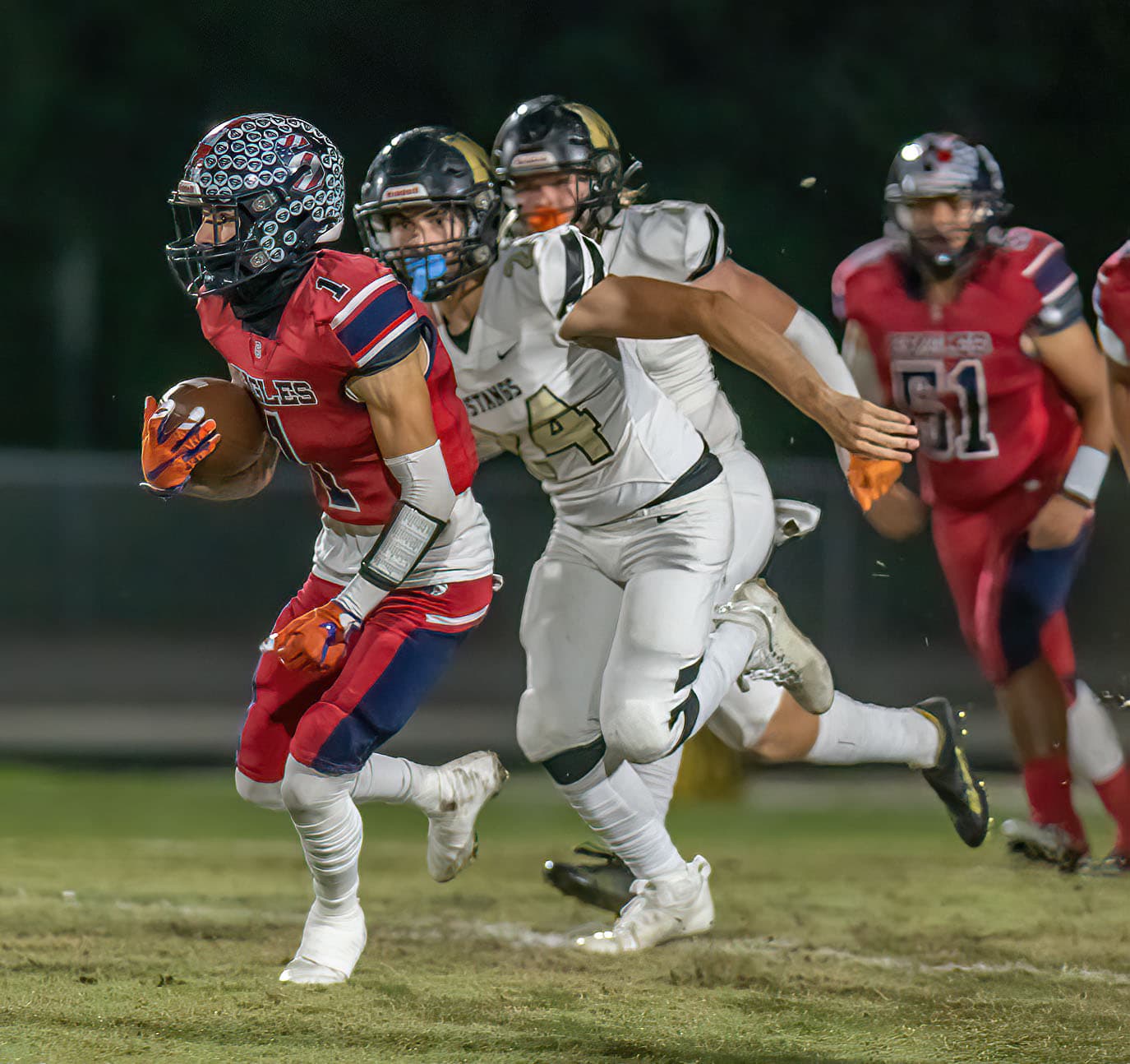 Luca Garguillo, 1, runs for yardage early in play off action for Springstead against Mitchell High at Booster Stadium in Spring Hill. Photo by JOE DiCRISTOFALO